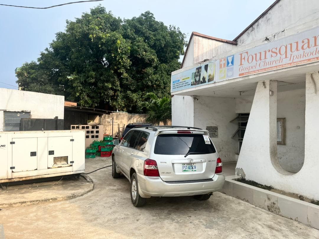 The current Foursquare Gospel Church, Ipakodo building, with its signage and standby generator.