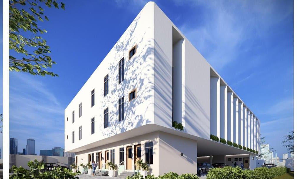 Render of the auditorium block seen from the street.